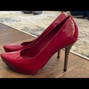 Gianni Bini Red with chrome heel. New without tag. Size 7